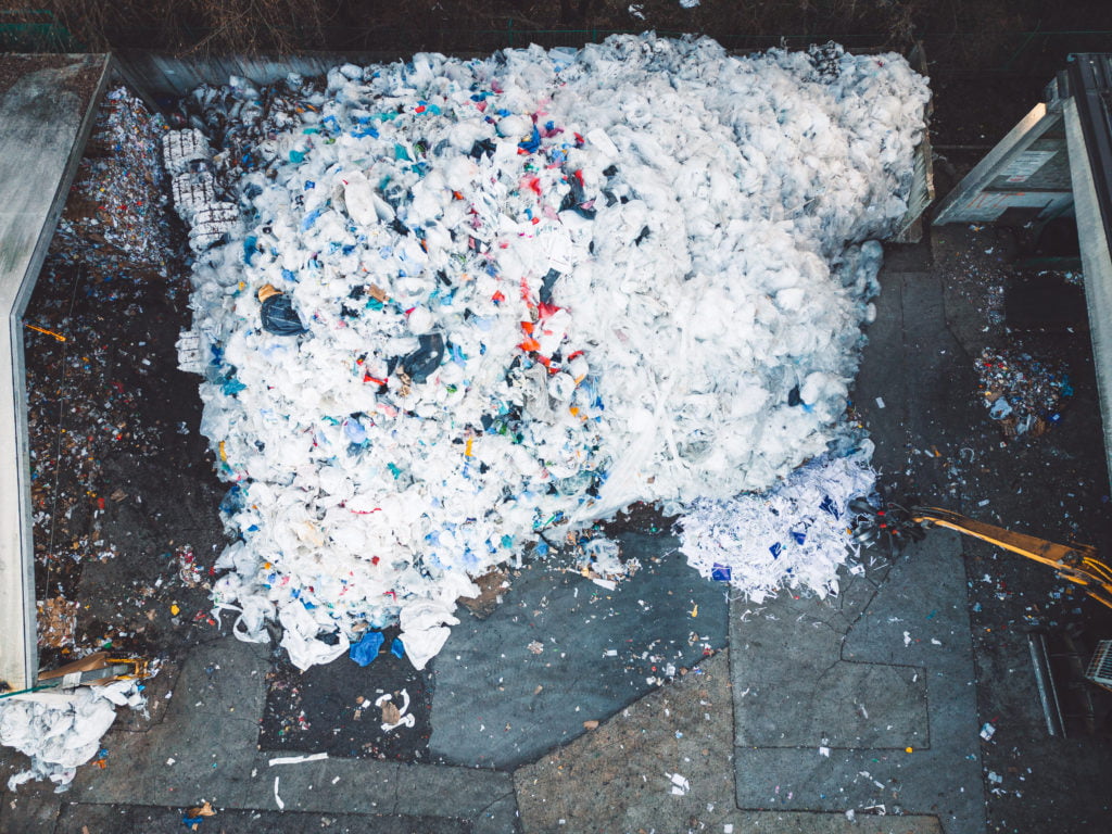 A pile of plastic garbage on the ground.